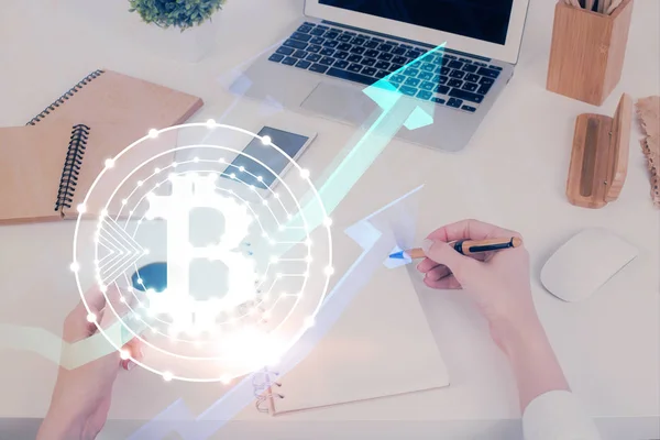 Cryptocurrency hologram over woman's hands writing background. Concept of blockchain. Multi exposure — Stock Photo, Image