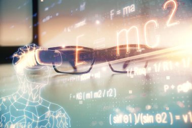 Masanın arkasına bardaklar çizilmiş formüller. Bilim kavramı. Çift pozlama.