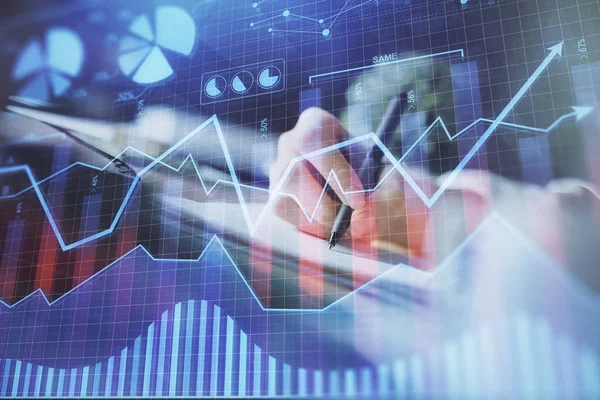 Gráfico de divisas financieras que se muestran en las manos tomando notas de fondo. Concepto de investigación. Exposición múltiple —  Fotos de Stock