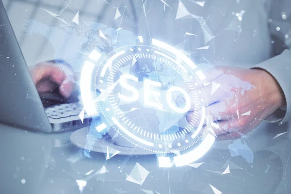 Multi exposure of seo icon with man working on computer on background. Concept of search engine optimization. — Stock Photo, Image