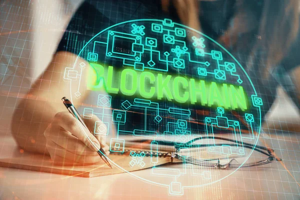 Cryptocurrency hologram over womans hands writing background. Concept of blockchain. Double exposure — Stock Photo, Image