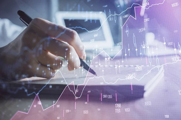 Financial charts displayed on womans hand taking notes background. Concept of research. Double exposure — Stock Photo, Image