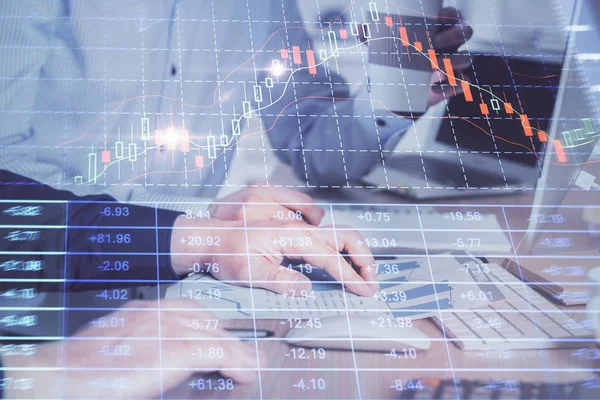 Multi exposure of chart with man typing on computer in office on background. Concept of hard work. — Stock Photo, Image