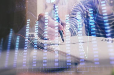 Finansal Forex grafiği el notları arka plan alarak çizilmiş. Araştırma kavramı. Çift Pozlama