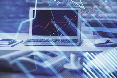 Finansal grafik renkli çizimler ve arka planda bilgisayar olan tablolar. Çoklu maruz kalma. Uluslararası pazarlar kavramı.