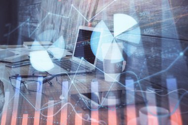 Kişisel bilgisayar arkaplanına çizilmiş borsa hologramı. Çifte maruziyet. Yatırım kavramı.