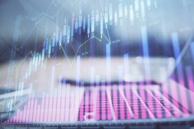 Arka planda eski pazar grafik hologramı ve kişisel bilgisayar var. Çoklu maruz kalma. Yatırım kavramı.