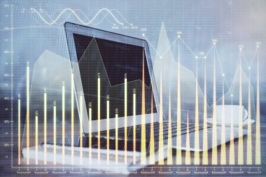 Arka planda eski pazar grafik hologramı ve kişisel bilgisayar var. Çoklu maruz kalma. Yatırım kavramı.