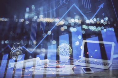 Arka planda eski pazar grafik hologramı ve kişisel bilgisayar var. Çoklu maruz kalma. Yatırım kavramı.