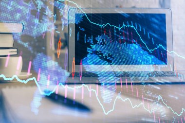 Finansal grafik renkli çizimler ve arka planda bilgisayar olan tablolar. Çoklu maruz kalma. Uluslararası pazarlar kavramı.