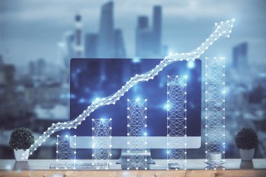 Finansal tablo çizimi ve arka planda bilgisayar olan bir tablo. Çifte maruziyet. Uluslararası pazarlar kavramı.