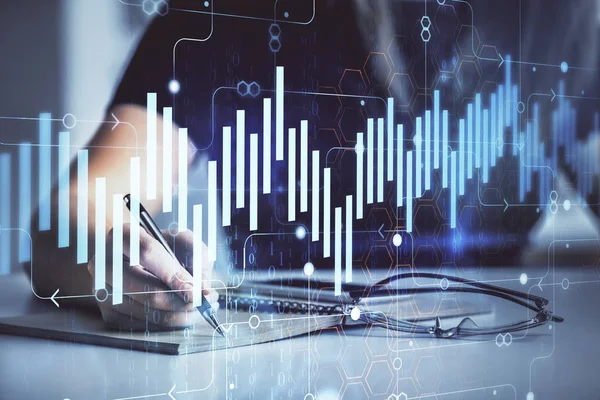 Multi exposición de las mujeres manos haciendo notas con el holograma gráfico de divisas. Concepto de análisis técnico . — Foto de Stock