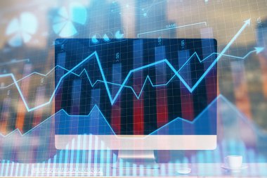 Finansal grafik renkli çizimler ve arka planda bilgisayar olan tablolar. Çifte maruziyet. Uluslararası pazarlar kavramı.