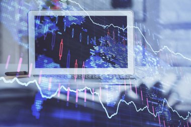 Finansal pazar grafiği hologramı ve kişisel bilgisayar arka planda. Çifte maruziyet. Önx kavramı.