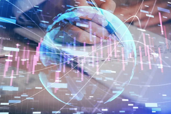 A woman hands writing information about stock market in notepad. Forex chart holograms in front. Concept of research. Multi exposure — Stock Photo, Image