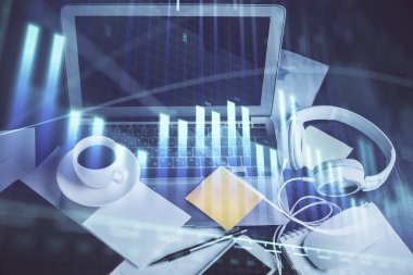 Kişisel bilgisayar arkaplanına çizilmiş borsa hologramı. Çifte maruziyet. Yatırım kavramı.