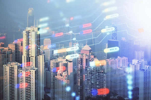 Data thema hologram tekening op uitzicht op de stad met wolkenkrabbers achtergrond dubbele blootstelling. Technologieconcept. — Stockfoto