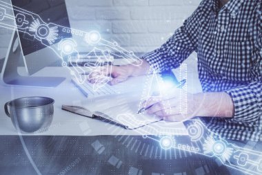 Teknoloji temalı çizimle Masaüstü 'nde çalışan bir iş adamı. Büyük veri kavramı. Çift pozlama.