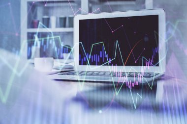 Kişisel bilgisayar arkaplanına çizilmiş borsa hologramı. Çoklu maruz kalma. Yatırım kavramı.