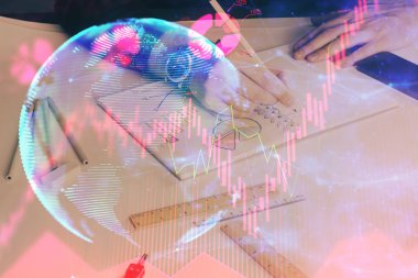 İş simgeleriyle ellerin ve not defterlerinin çifte pozlandırılması.