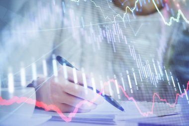 Forex tablosu WOMANS el notları arka plan alarak görüntülenir. Araştırma kavramı. Çoklu pozlama