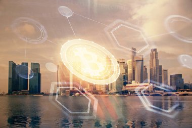 Kripto para birimi temalı hologram çizimine ve şehrin arka planına çoklu maruz kalma. Engelleme zinciri ve bitcoin kavramı.