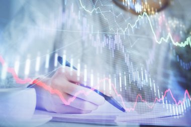 Forex tablosu WOMANS el notları arka plan alarak görüntülenir. Araştırma kavramı. Çoklu pozlama