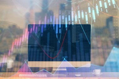 Kişisel bilgisayar arkaplanına çizilmiş borsa hologramı. Çifte maruziyet. Yatırım kavramı.