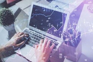 Forex grafik arka plan ile borsa notları yazma mans elçift pozlama. Araştırma ve ticaret kavramı.