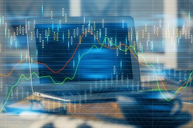 Finansal grafik renkli çizimler ve arka planda bilgisayar olan tablolar. Çoklu maruz kalma. Uluslararası pazarlar kavramı.