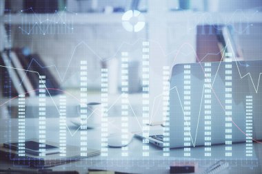 Finansal tablo çizimi ve arka planda bilgisayar olan bir tablo. Çoklu maruz kalma. Uluslararası pazarlar kavramı.