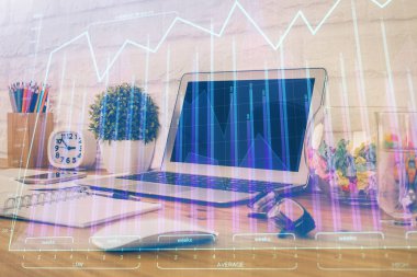 Finansal grafik renkli çizimler ve arka planda bilgisayar olan tablolar. Çoklu maruz kalma. Uluslararası pazarlar kavramı.