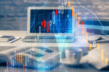 Finansal grafik renkli çizimler ve arka planda bilgisayar olan tablolar. Çifte maruziyet. Uluslararası pazarlar kavramı.