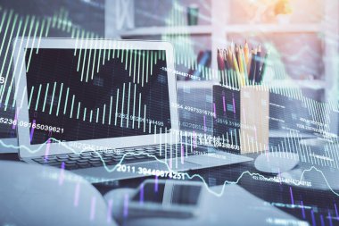 Arka planda eski pazar grafik hologramı ve kişisel bilgisayar var. Çifte maruziyet. Yatırım kavramı.