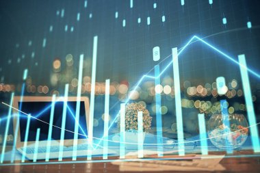 Finansal grafik renkli çizimler ve arka planda bilgisayar olan tablolar. Çifte maruziyet. Uluslararası pazarlar kavramı.