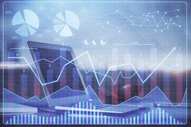 Finansal grafik renkli çizimler ve arka planda bilgisayar olan tablolar. Çoklu maruz kalma. Uluslararası pazarlar kavramı.