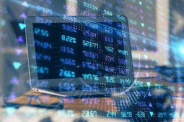 Finansal pazar grafiği hologramı ve kişisel bilgisayar arka planda. Çifte maruziyet. Önx kavramı.