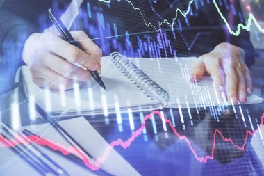 Forex grafik hologram el notları arka plan alarak. Analiz kavramı. Çoklu pozlama