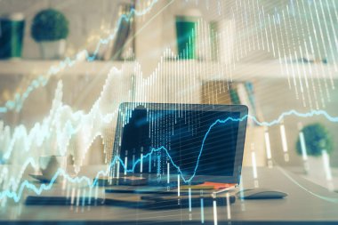 Kişisel bilgisayar arkaplanına çizilmiş borsa hologramı. Çifte maruziyet. Yatırım kavramı.