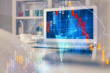 Finansal tablo çizimi ve arka planda bilgisayar olan bir tablo. Çifte maruziyet. Uluslararası pazarlar kavramı.