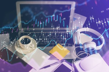 Finansal grafik renkli çizimler ve arka planda bilgisayar olan tablolar. Çoklu maruz kalma. Uluslararası pazarlar kavramı.