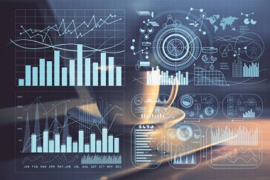 Finansal grafik renkli çizimler ve arka planda bilgisayar olan tablolar. Çoklu maruz kalma. Uluslararası pazarlar kavramı.