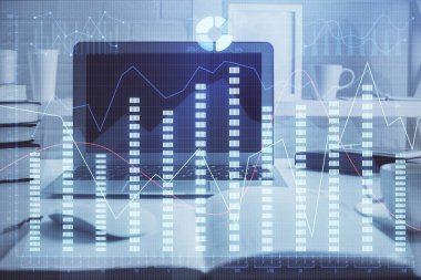 Finansal tablo çizimi ve arka planda bilgisayar olan bir tablo. Çoklu maruz kalma. Uluslararası pazarlar kavramı.