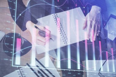 Forex grafik hologram el notları arka plan alarak. Analiz kavramı. Çoklu pozlama