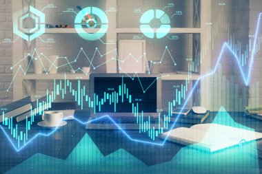 Finansal tablo çizimi ve arka planda bilgisayar olan bir tablo. Çifte maruziyet. Uluslararası pazarlar kavramı.