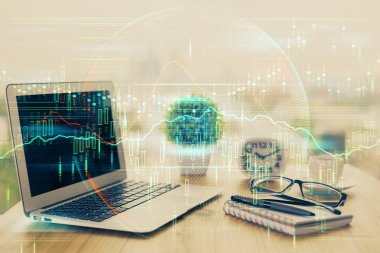 Finansal tablo çizimi ve arka planda bilgisayar olan bir tablo. Çoklu maruz kalma. Uluslararası pazarlar kavramı.