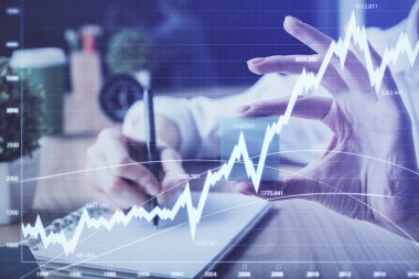 Forex tablosu WOMANS el notları arka plan alarak görüntülenir. Araştırma kavramı. Çoklu pozlama
