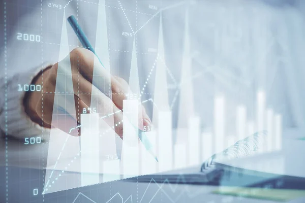 Gráfico de divisas financieras que se muestran en las manos tomando notas de fondo. Concepto de investigación. Doble exposición —  Fotos de Stock