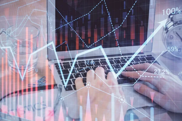 Multi exposure of market chart with man working on computer on background. Concept of financial analysis. — Stock Photo, Image