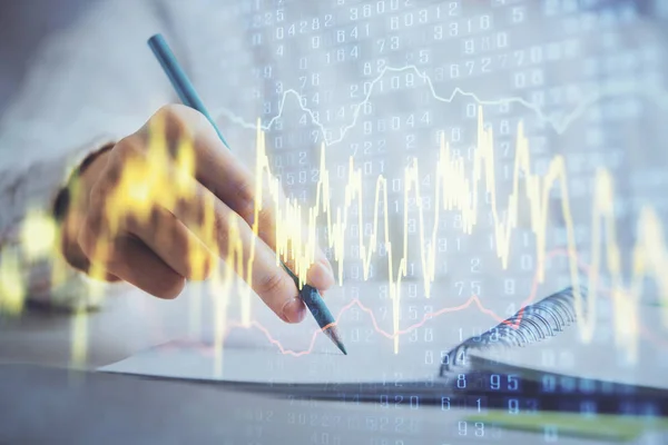 Gráfico de divisas financieras que se muestran en las manos tomando notas de fondo. Concepto de investigación. Doble exposición —  Fotos de Stock